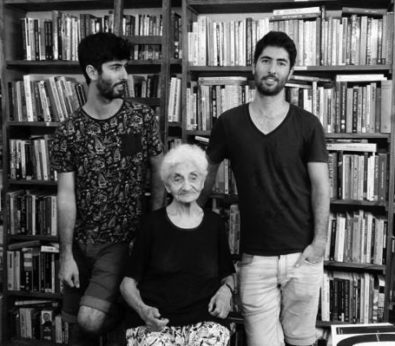 Alon-Lee Green, left, with his grandmother and brother Ellie in the Brothers Green bookstore in Tel Aviv. (Photo: American Jewish Peace Archive)