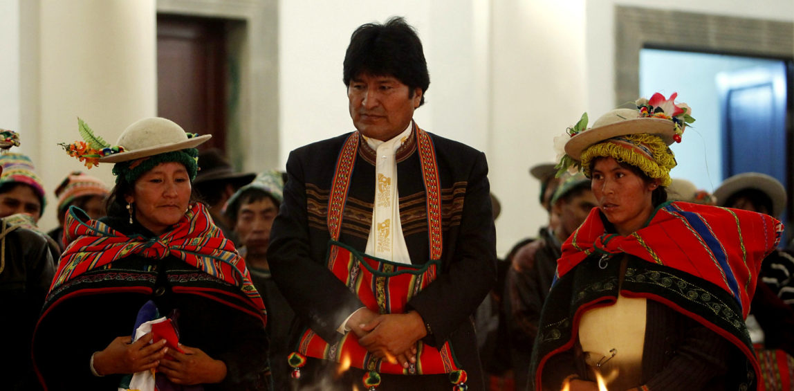 Bolivia's President Evo Morales, top, attends a ritual ceremony honoring Pachamama, Mother Earth, at the government palace in La Paz, Bolivia. (AP/Juan Karita)