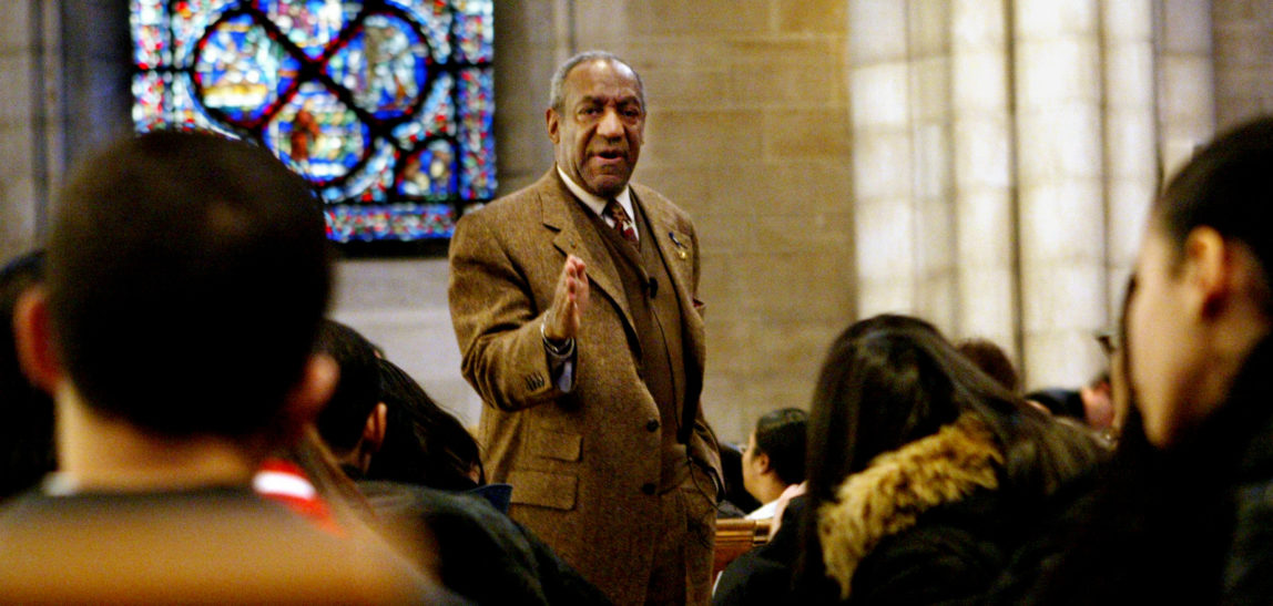 Bill Cosby speaks to students during at a tribute marking the 50th anniversary of Brown v. Board of Education at Riverside Church in Manhattan, N.Y., Monday, Feb. 2, 2004. Cosby got serious with 500 ninth-graders at a talk commemorating the U.S. Supreme Court's landmark ruling. The event was hosted by Columbia University's Teachers College, where Cosby's son Ennis was a doctoral student when he was fatally shot in 1997. (AP Photo/Bebeto Matthews)