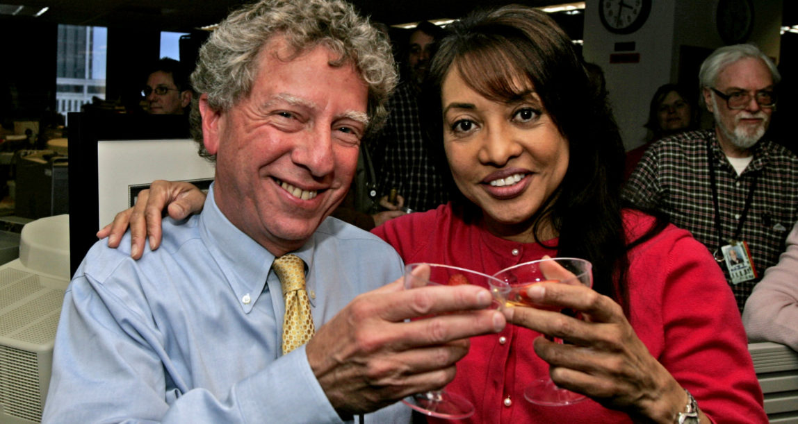 Hank Klibanoff, managing editor of The Atlanta Journal-Constitution, and editorial page editor Cynthia Tucker celebrate in the newsroom Monday, April 16, 2007, after it was announced that they won the 2007 Pulitzer Prize for history and commentary. (AP/John Bazemore)