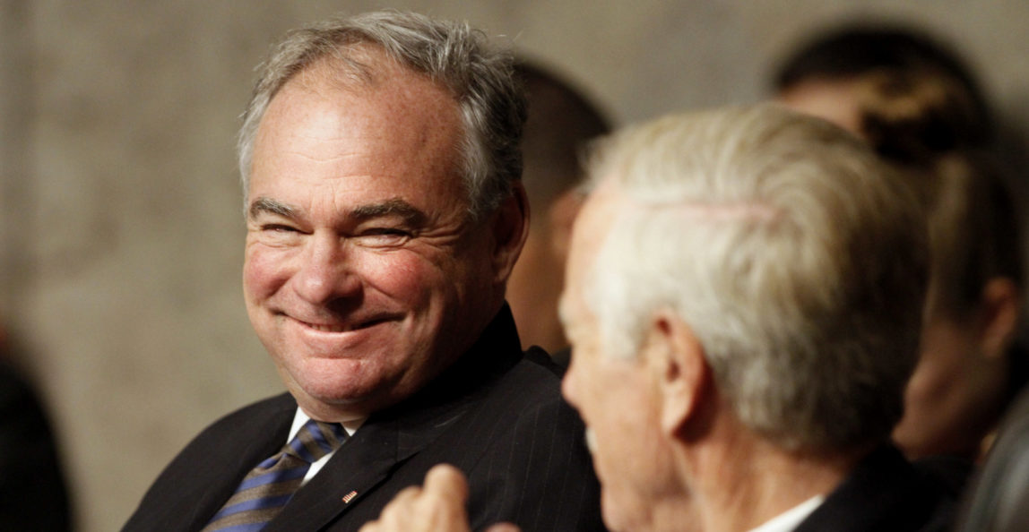 Senate Armed Services Committee members Sen. Tim Kaine, D-Va., left, and Sen. Angus King, I-Maine, talk on Capitol Hill in Washington, Tuesday, July 11, 2017, during the committee's confirmation hearing for Navy Secretary nominee Richard Spencer. (AP Photo/Jacquelyn Martin)