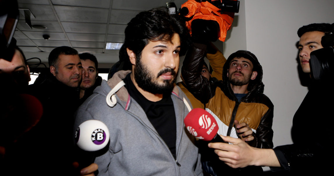 Turkish-Iranian businessman Reza Zarrab, who is charged currently in the U.S. for evading sanctions on Iran, is surrounded by the media members as he arrives at a courthouse in Istanbul, in a separate case against him. (Depo Photos via AP)