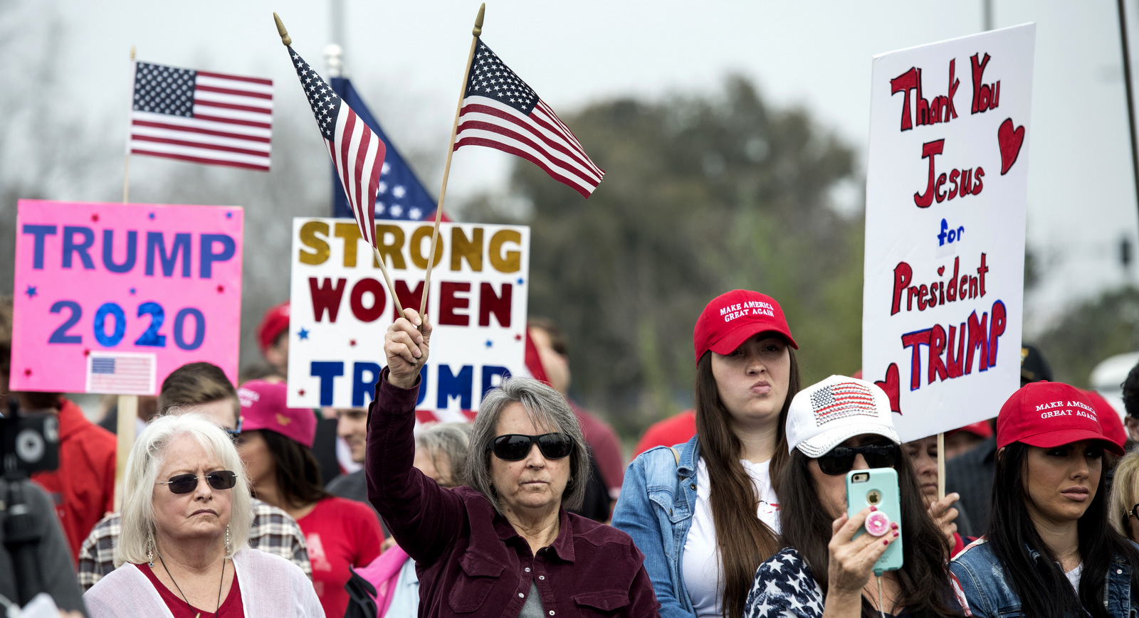 Supporters of President Trump gather for a rally Tuesday, March 13, 2018, in San Diego. (AP Photo/Kyusung Gong)