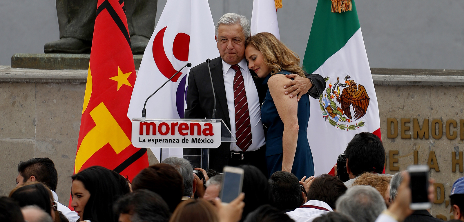 Presidential candidate Andres Manuel Lopez Obrador embraces his wife Beatriz Gutierrez after formalizing his candidacy at the National Electoral Institute in Mexico City, March 16, 2018. Mexico will hold elections on July 1. (AP/Eduardo Verdugo)