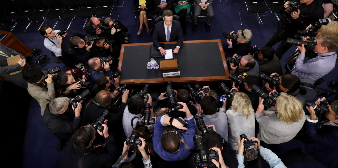 Facebook CEO Mark Zuckerberg arrives to testify before a joint hearing of the Commerce and Judiciary Committees on Capitol Hill in Washington, Tuesday, April 10, 2018, about the use of Facebook data to target American voters in the 2016 election. (AP Photo/Pablo Martinez Monsivais)