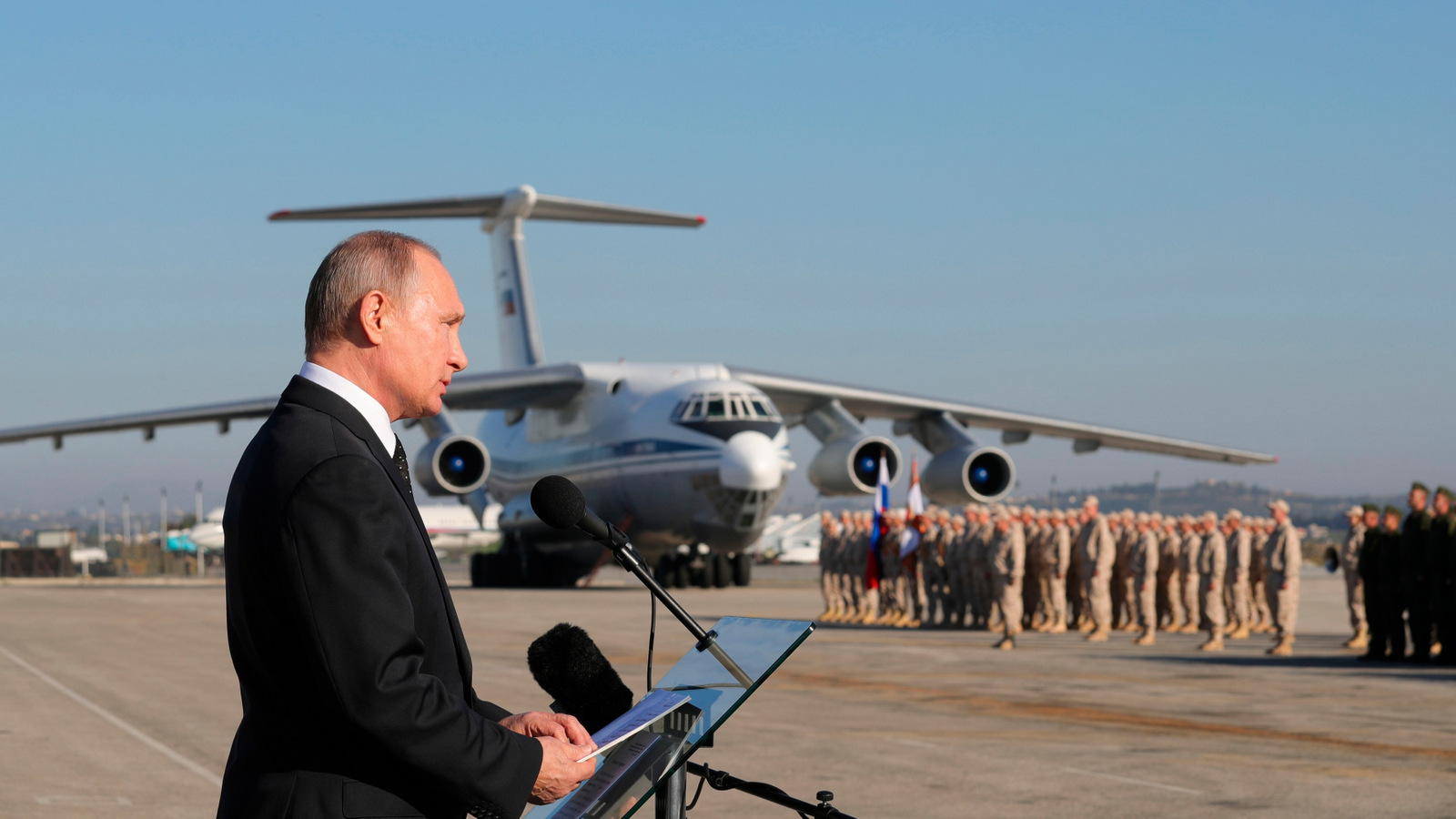 Russian President Vladimir Putin addresses the troops at the Hemeimeem air base in Syria, Dec. 12, 2017. (Mikhail Klimentyev via AP)