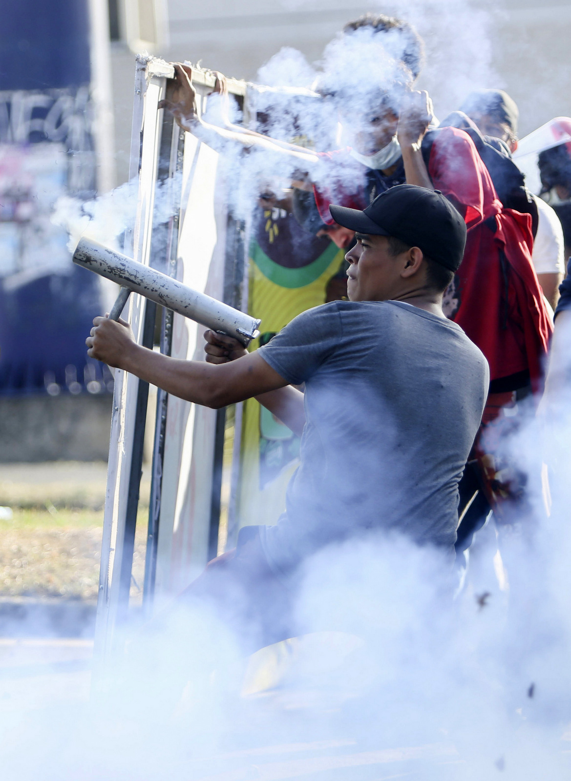 A protester fires from a homemade mortar at riot police during a third day of violent clashes in Managua, Nicaragua, April 20, 2018. The clashes, pitting protesters opposed to social security reforms against riot police and pro-government groups, have rocked the capital, and a half-dozen other cities over the last three days. The Organization of American States have expressed concern over the heavy-handed crackdown, while also calling on demonstrators to protest peacefully. (AP/Alfredo Zuniga)