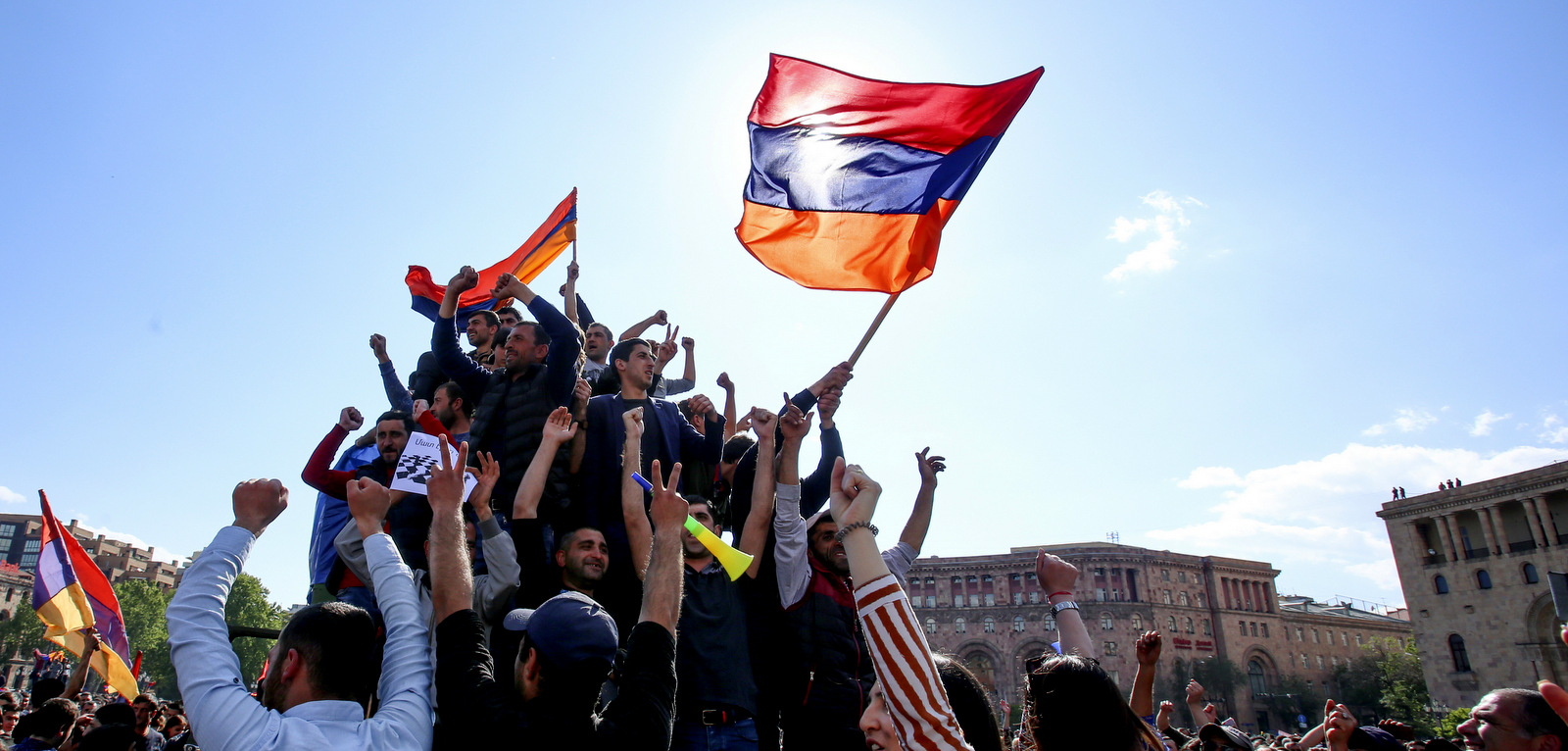 People celebrate Armenian Prime Minister's Serzh Sargsyan's resignation in Republic Square in Yerevan, Armenia, April 23, 2018. Sargsyan resigned unexpectedly on Monday, an apparent move to bring to an end massive anti-government protests. (Grigor Yepremyan/PAN/AP)
