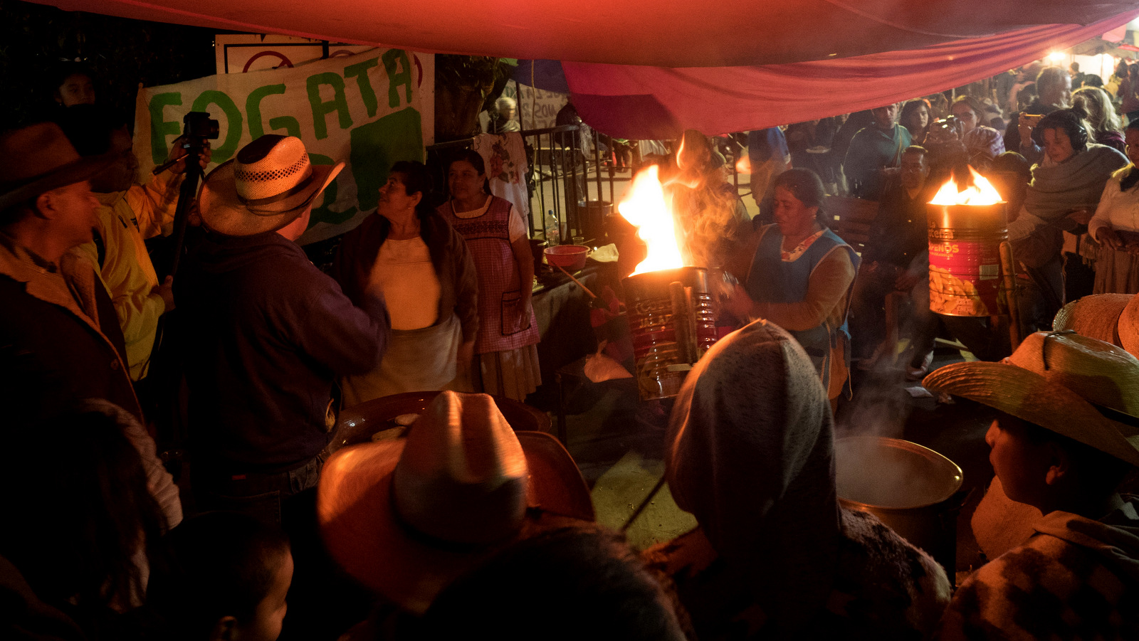 A small crowd visits one of the local bonfires, a part of events commemorating the seventh anniversary of the community uprising against illegal loggers and organized crime in Cheran, Michoacan, April 15, 2018. (Photo: José Luis Granados Ceja)
