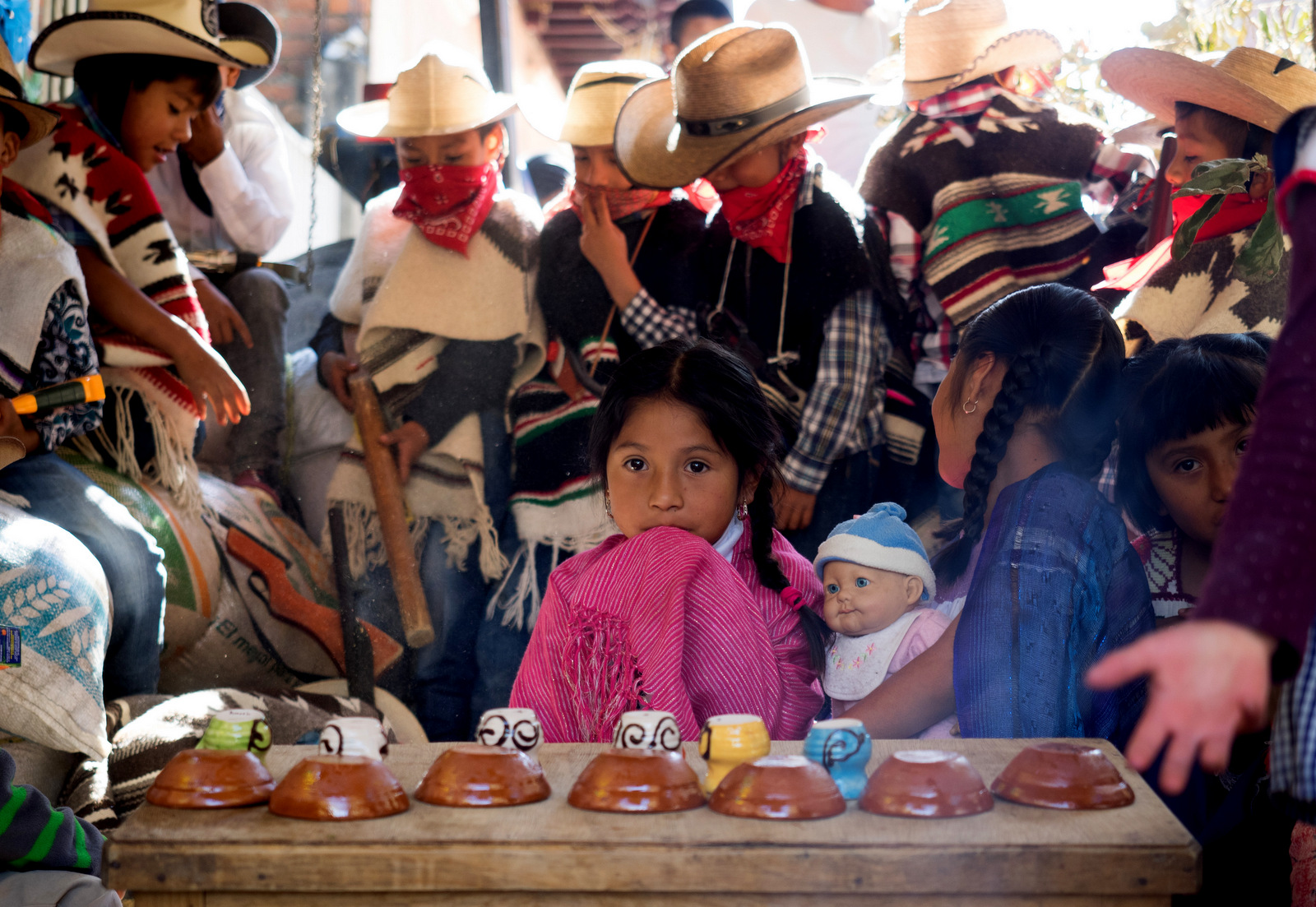 A young girl is surrounded by her classmates as they wait for the march commemorating the seventh anniversary of the community uprising, April 15, 2018. (Photo: José Luis Granados Ceja)