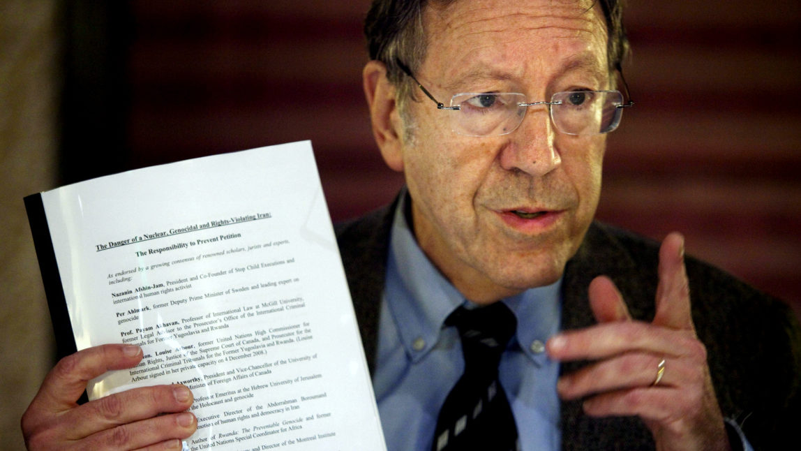 Former Canadian justice minister Irwin Cotler speaks to the media during a press conference in Jerusalem in 2009 where he announced a campaign for action against Iran. Dan Balilty | AP