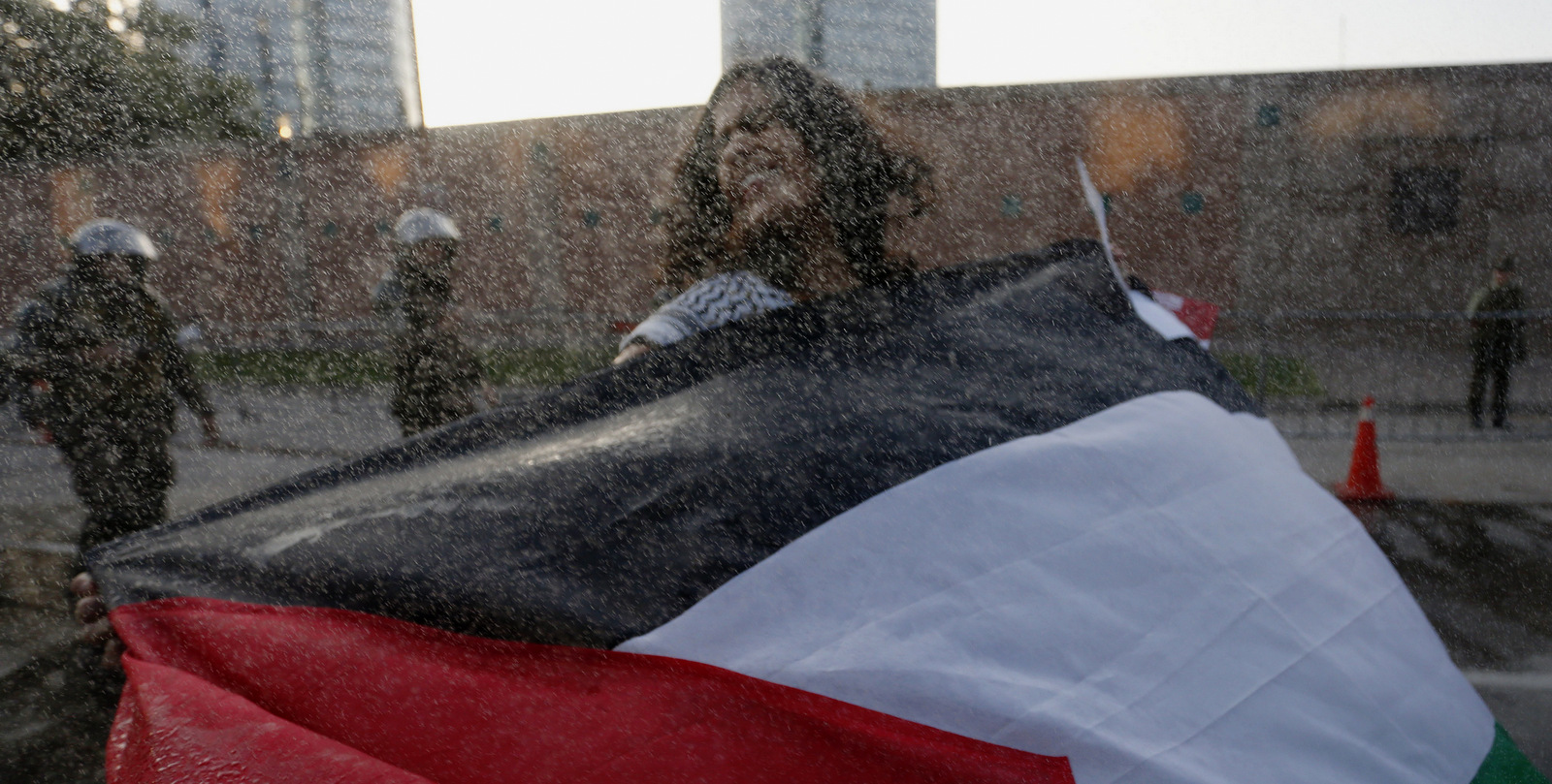 A woman protests U.S. President Donald Trump's decision to recognize Jerusalem as Israel's capital, outside the U.S. Embassy in Santiago, Chile, Dec. 11, 2017. The protest was organized by the Palestinian community in Chile. (AP/Luis Hidalgo)