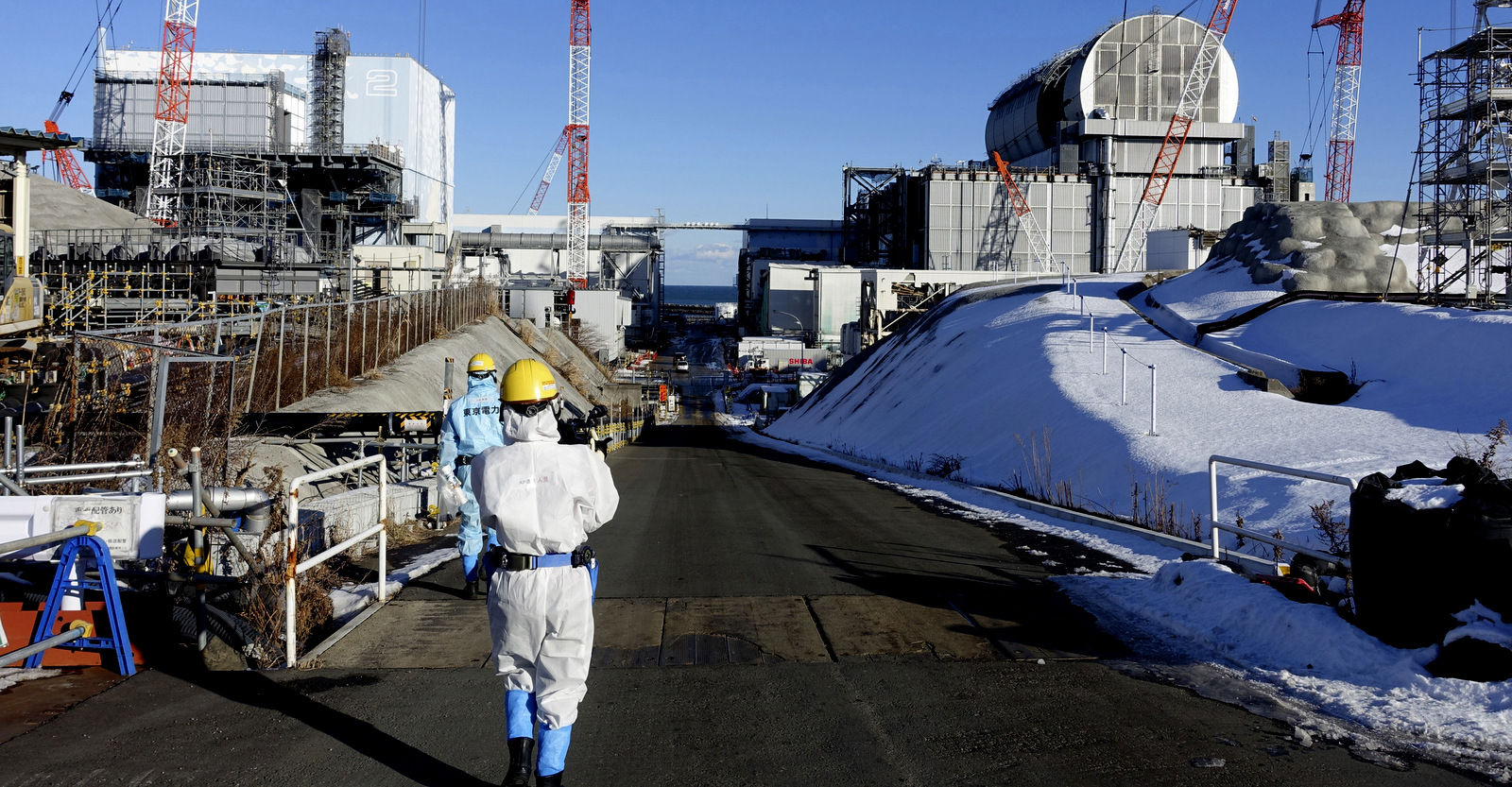 A dome-shaped rooftop covers key equipment at Unit 3 reactor of the Fukushima Dai-ichi nuclear power plant ahead of a fuel removal from its storage pool in Okuma, Fukushima Prefecture, northeast Japan, Jan. 25, 2018. (AP/Mari Yamaguchi)