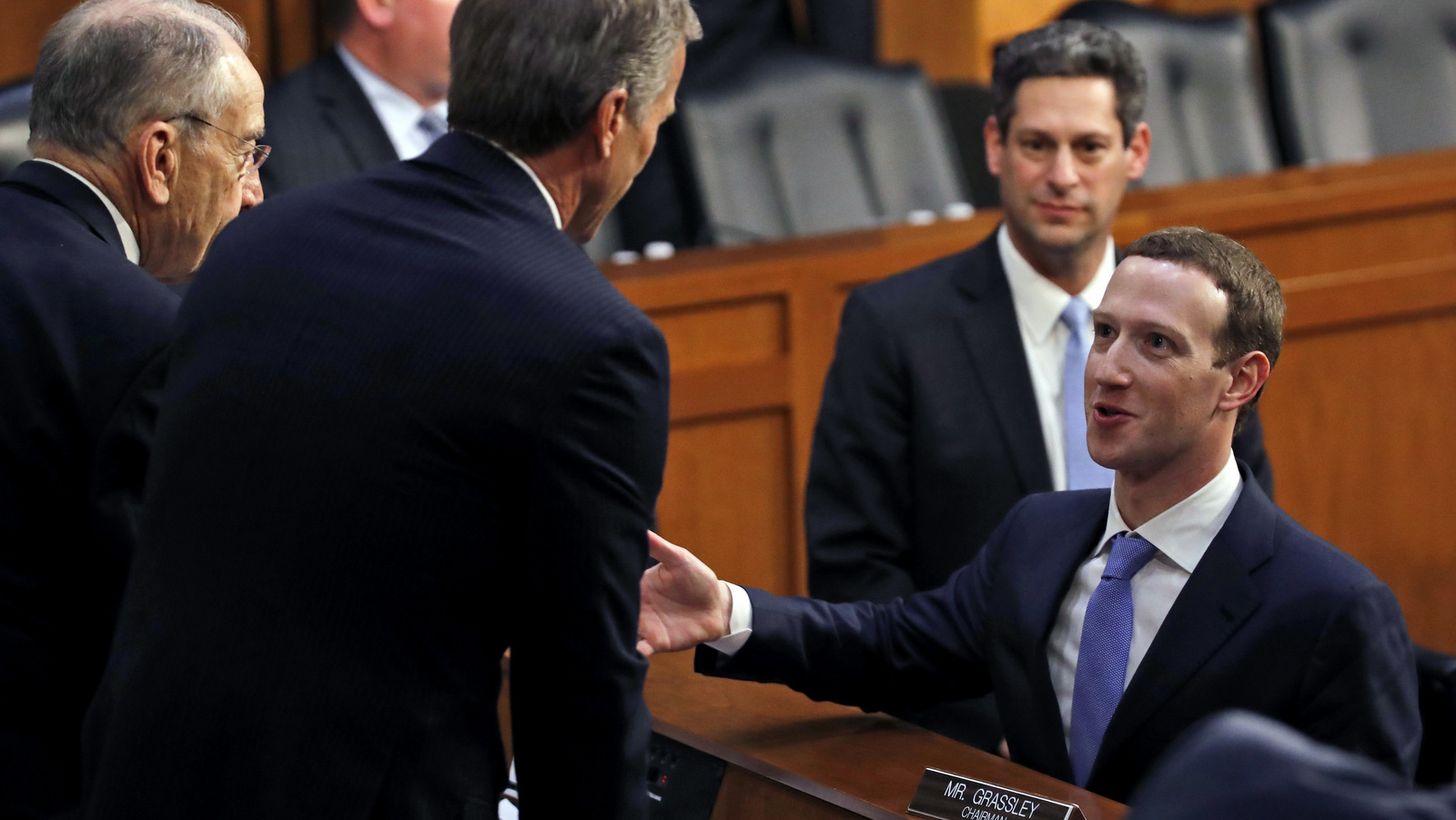 Facebook CEO Mark Zuckerberg meets with Senators Chuck Grassley, R-Iowa, left, and John Thune, R-S.D., after a Commerce and Judiciary Committees hearing in Washington, April 10, 2018. (AP/Alex Brandon)