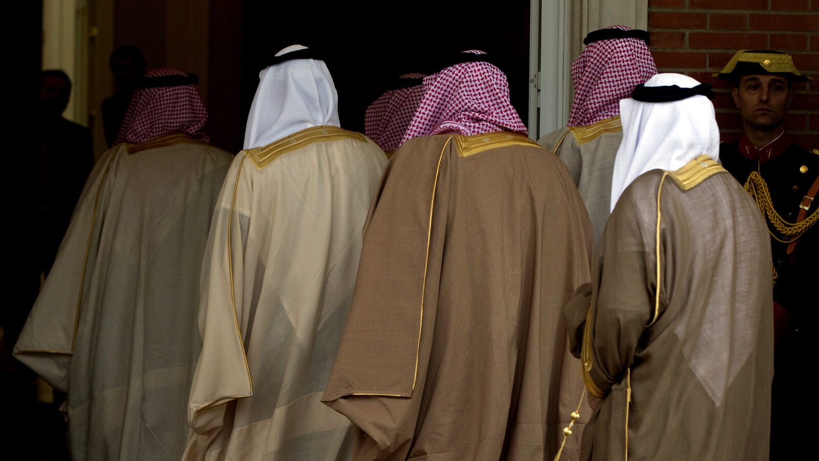 Saudi Arabia ministers enter the Moncloa Palace for ceremony presided by Saudi Crown Prince Mohammed bin Salman and Spain's Prime Minister Mariano Rajoy, in Madrid, Spain, April 12, 2018. Paul White | AP