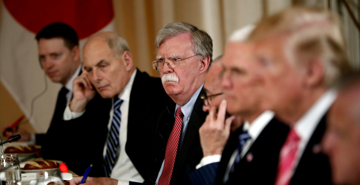 President Donald Trump, second from right, listens during a working lunch with Japanese Prime Minister Shinzo Abe at Trump's private Mar-a-Lago club, Wednesday, April 18, 2018, in Palm Beach, Fla. Also listens are White House chief of staff John Kelly, second from left, national security adviser John Bolton, thrid from left, and Vice President Mike Pence, third from right. (AP Photo/Pablo Martinez Monsivais)