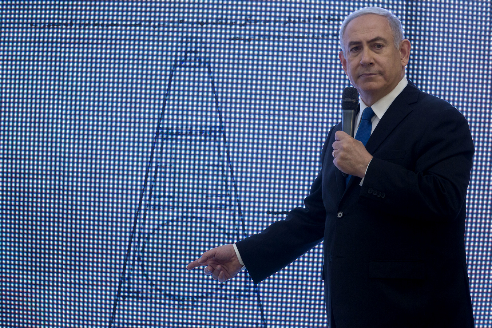 Israeli Prime Minister Benjamin Netanyahu presents material he claims proves Iranian nuclear weapons development during a press conference in Tel Aviv, April 30 2018. (AP/Sebastian Scheiner)