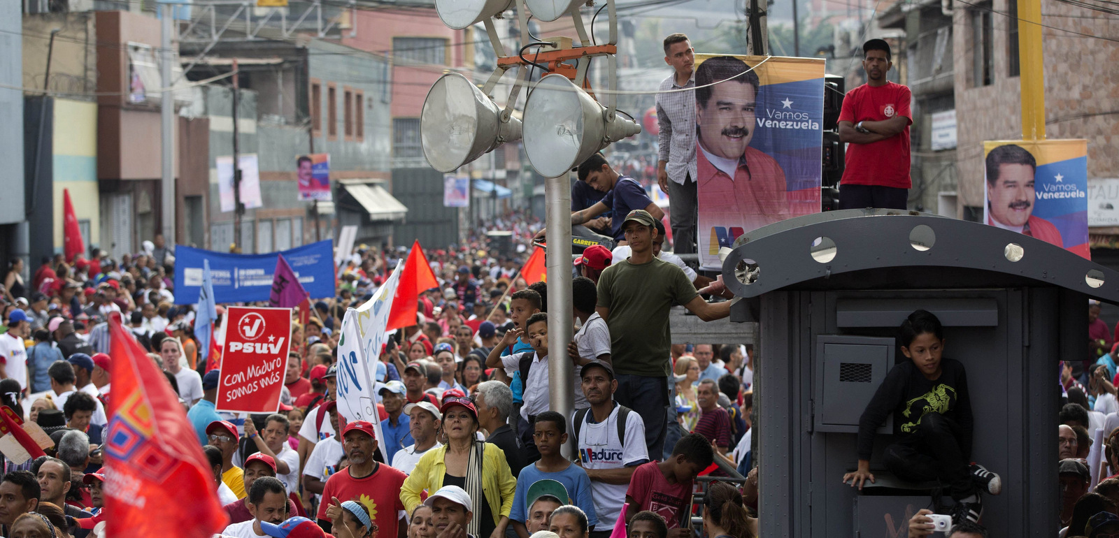 Supporters of President Nicolas Maduro attend a campaign rally in the parish of Catia in Caracas, Venezuela, Friday, May 4, 2018. Venezuelans will vote for a new president in the upcoming presidential elections on May 20. (AP/Ariana Cubillos)