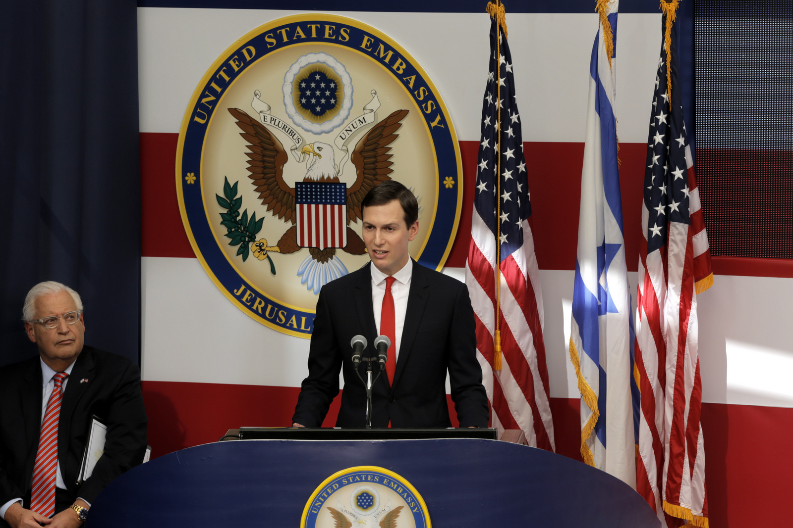 White House senior adviser Jared Kushner, right, speaks as U.S. Ambassador to Israel David Friedman listens during the opening ceremony of the new US embassy in in Jerusalem, Monday, May 14, 2018. (AP/Sebastian Scheiner)