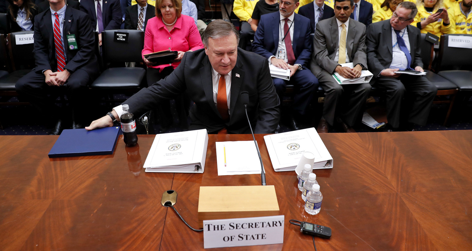 Secretary of State Mike Pompeo takes his seat as he prepares to testify at the House Foreign Affairs Committee hearing on Capitol Hill in Washington, Wednesday, May 23, 2018. (AP Photo/Pablo Martinez Monsivais)