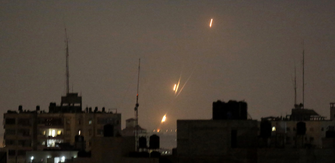 Flames of rockets fired by Palestinian militants are seen over Gaza, May 30, 2018. Hatem Moussa | AP