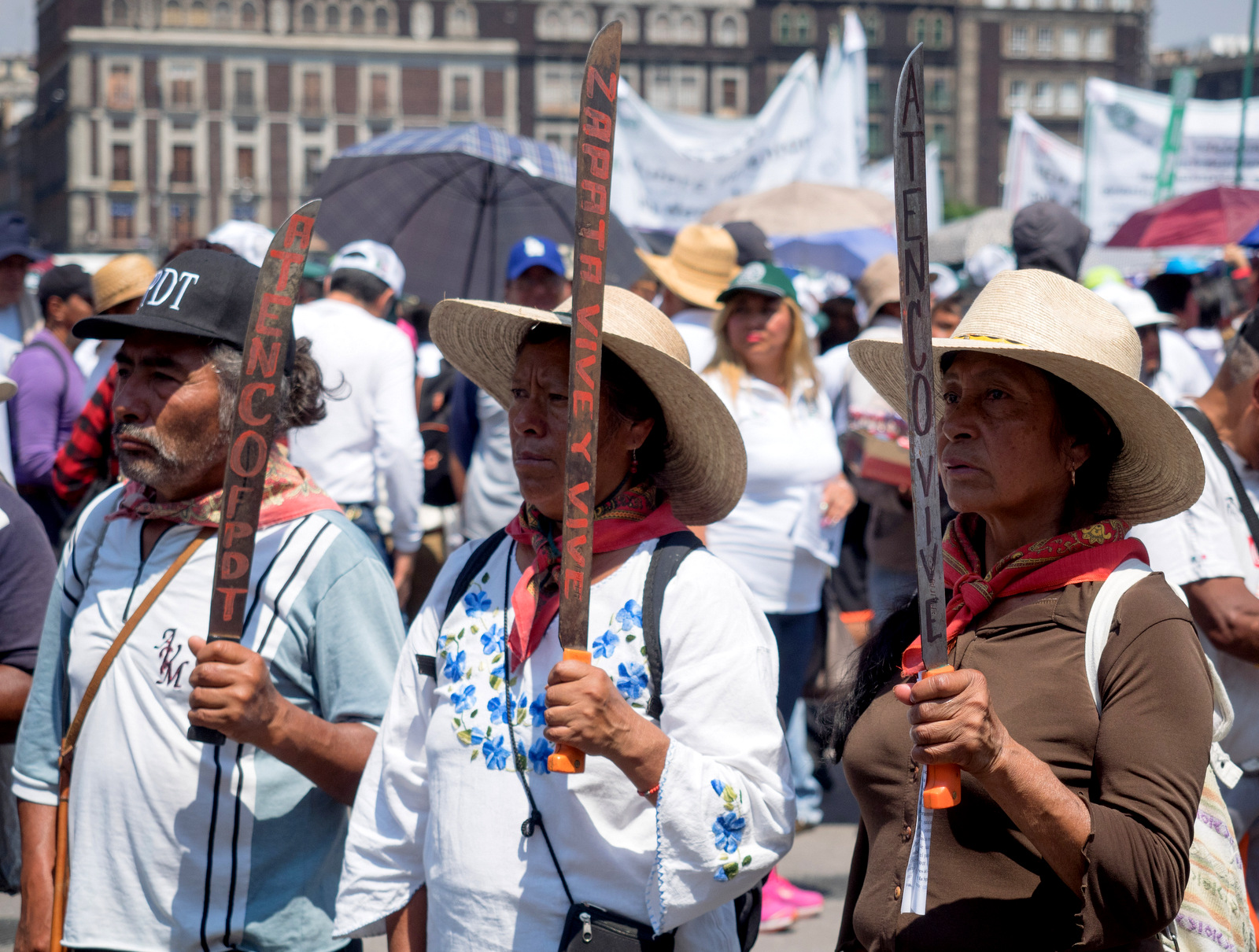 Land defenders from San Salvador Atenco, demonstrate to show their opposition to a new airport on their territory during a MayDay rally in Mexico City, May 1, 2018. (Photo: José Luis Granados Ceja)