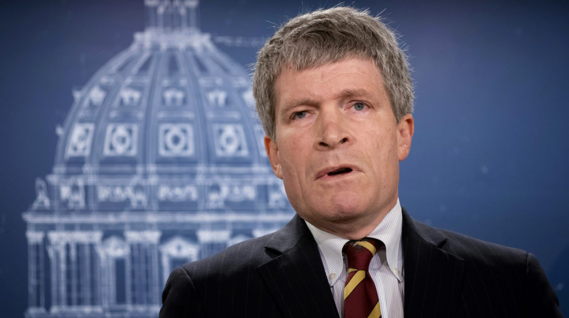 Former Republican White House lawyer in President George W. Bush's administration Richard Painter announces his candidacy for U.S. Senate as a Democrat in St. Paul, Minn., Monday, April 30, 2018. Explaining his party swap, Painter said it's clear to him there's no space for a Republican who opposes the president. (Glen Stubbe/Star Tribune via AP)