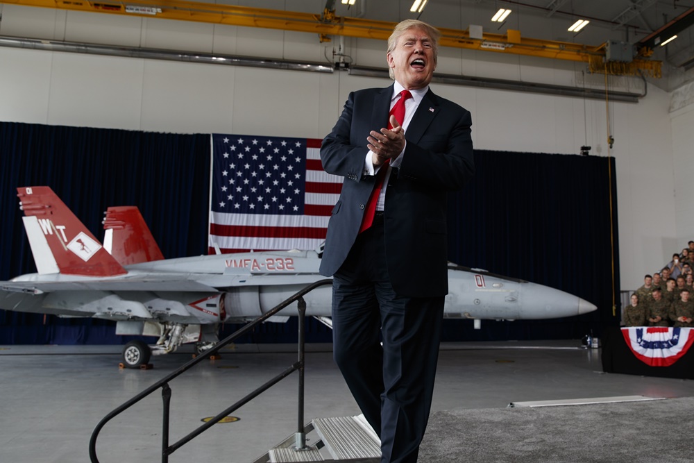 Donald Trump gestures after speaking to service members at Miramar Air Corps Air Station, March 13, 2018, in San Diego. (AP/Evan Vucci)