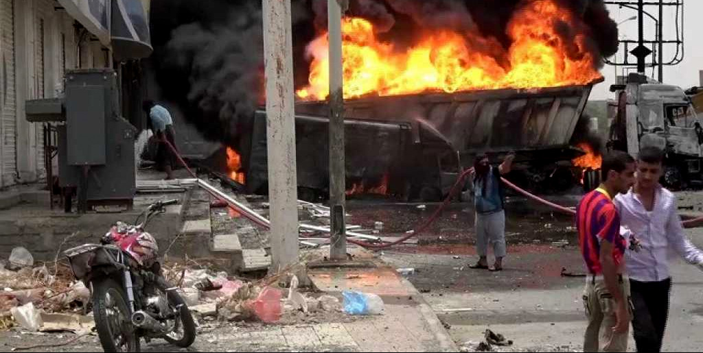 A tanker burns after Saudi airstrikes targeted workers who were transporting tires and oil from a shop in central Hodeida on Wednesday, June 20, 2018. Photo | Ahmed Abdulkareem