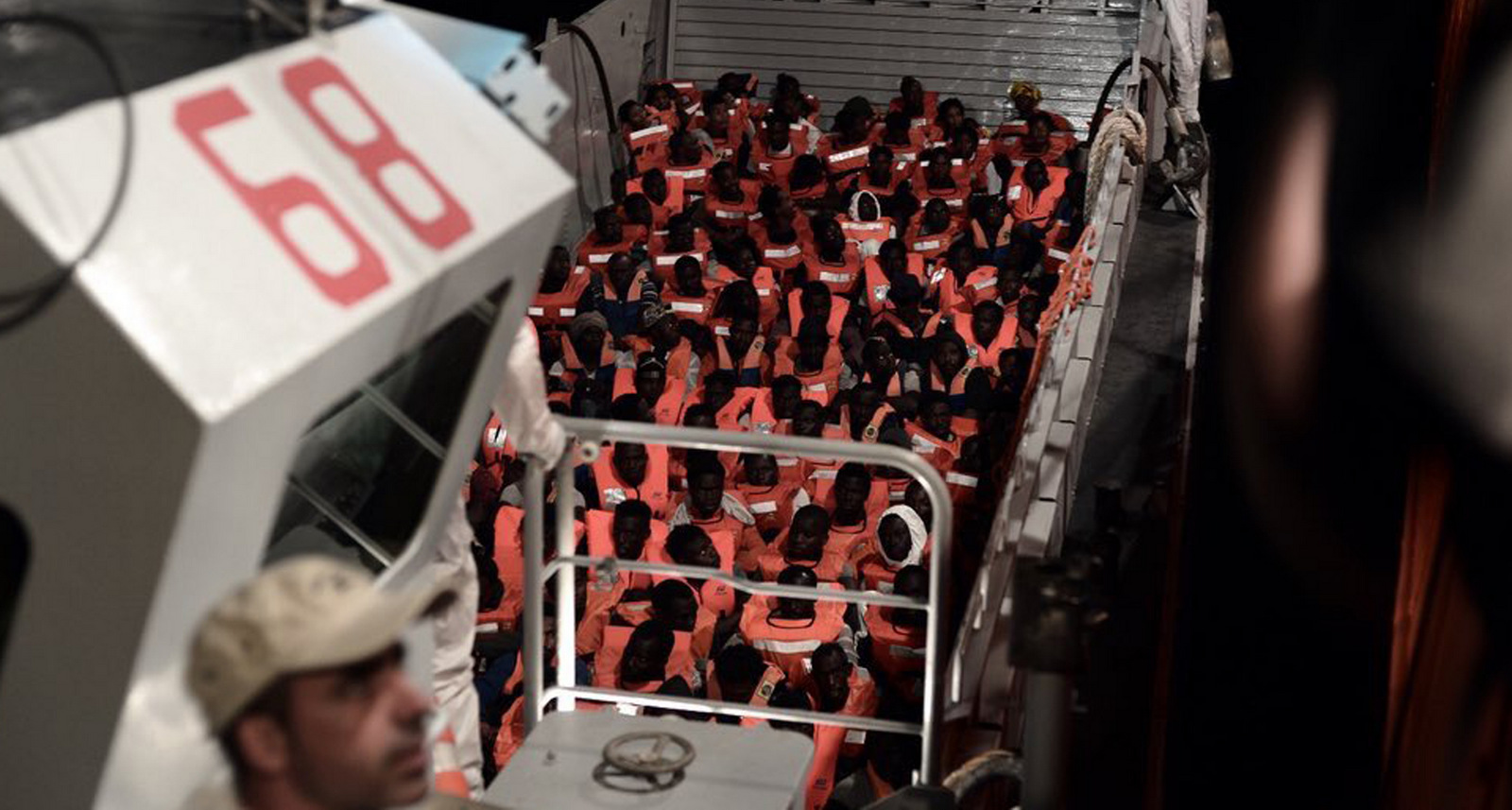 This undated photo released by by French NGO "SOS Mediterranee" on Monday June 11, 2018 and posted on it's Twitter account, shows migrants about to board the SOS Mediterranee's Aquarius ship and MSF (Doctors Without Borders) NGOs, in the Mediterranean Sea. I Kenny Karpov | SOS Mediterranee via AP