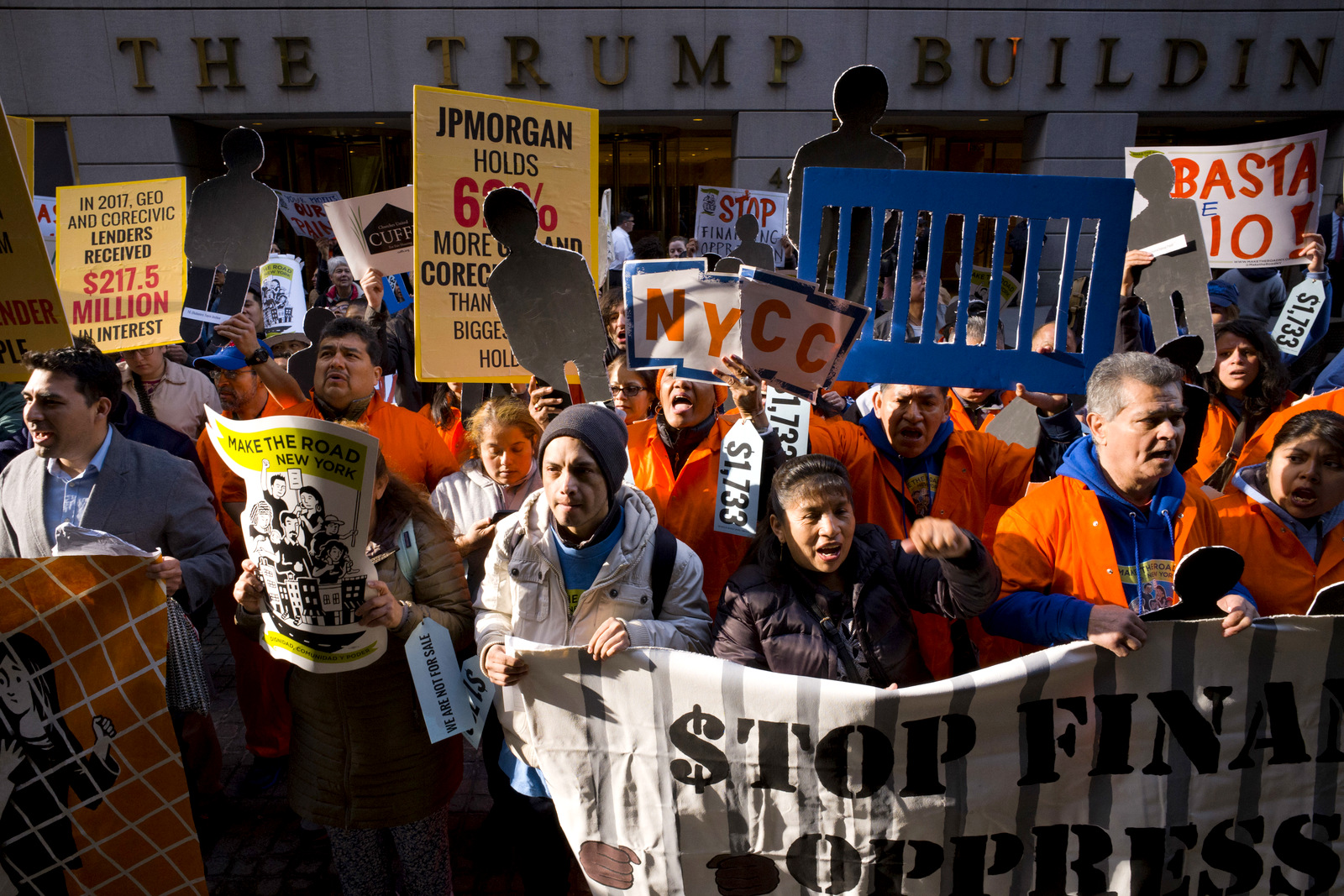 Protesters march on Wall Street in New York to demand the government address labor issues, May 1, 2018. Mark Lennihan | AP