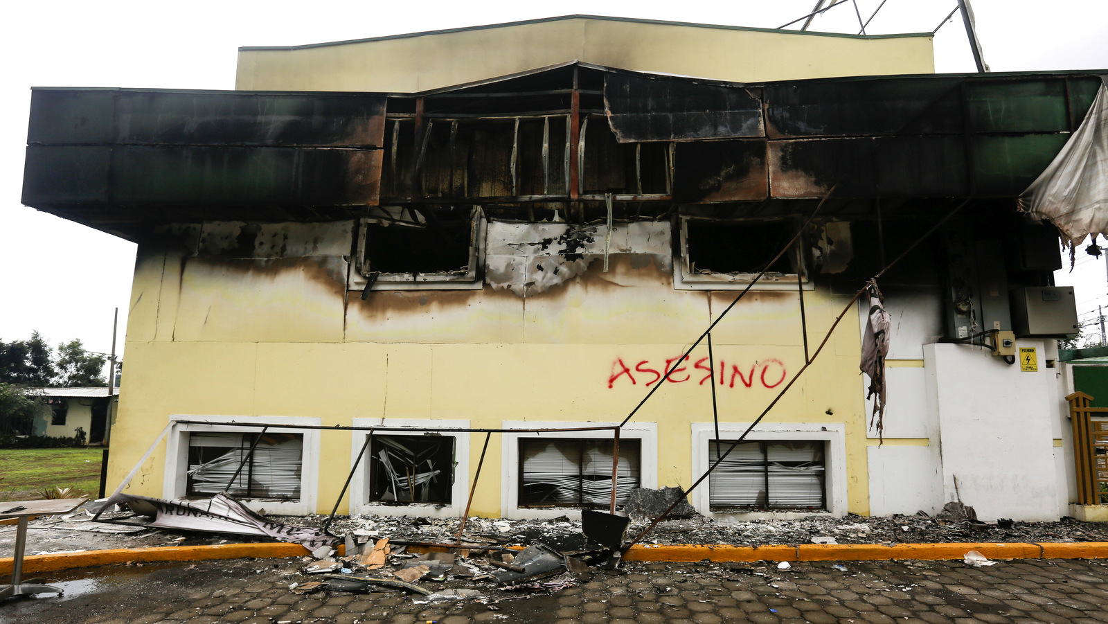 The government rural financial entity, CARUNA, a day after it was torched by anti-government protesters in Managua, Nicaragua, May 31, 2018. Alfredo Zuniga | AP