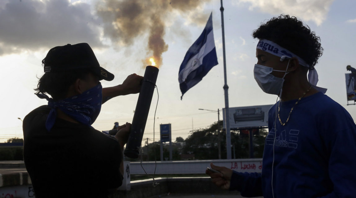 Opposition protesters set off a mortar during an anti-government protest in Managua, Nicaragua, June 1, 2018. Alfredo Zuniga | AP