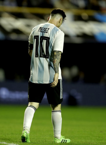 Argentina's Lionel Messi walks on the pitch during a friendly soccer match between Argentina and Haiti in Buenos Aires, Argentina, May 29, 2018. Victor R. Caivano | AP
