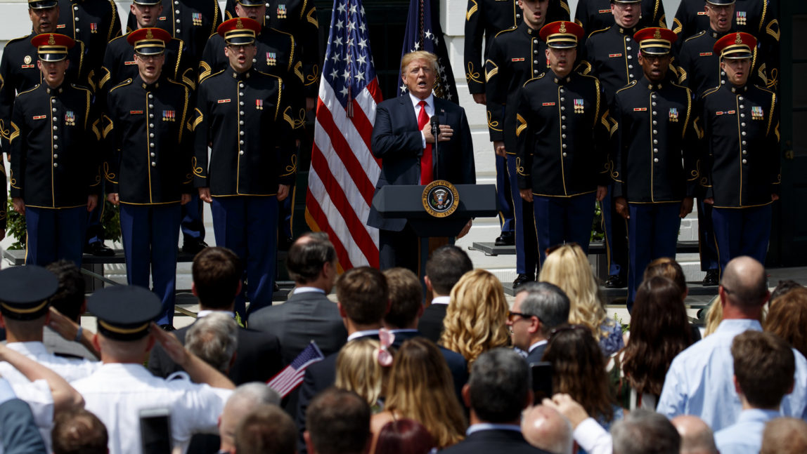 President Donald Trump sings the national anthem during a "Celebration of America" event at the White House, Tuesday, June 5, 2018, in Washington, in lieu of a Super Bowl celebration for the NFL's Philadelphia Eagles that he canceled. Evan Vucci | AP
