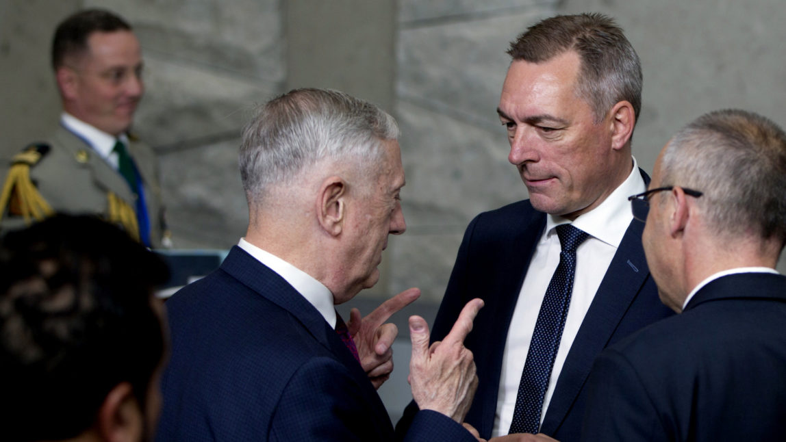 U.S. Secretary for Defense Jim Mattis, center left, speaks with Norway's Defense Minister Frank Bakke-Jensen, center right, prior to a group photo at a NATO defense ministers at NATO headquarters in Brussels, Thursday, June 7, 2018. NATO defense ministers gather Thursday determined to show fresh resolve against Russia while hoping to prevent a series of festering trans-Atlantic disputes from undermining unity across the 29-nation military alliance. (AP Photo/Virginia Mayo)