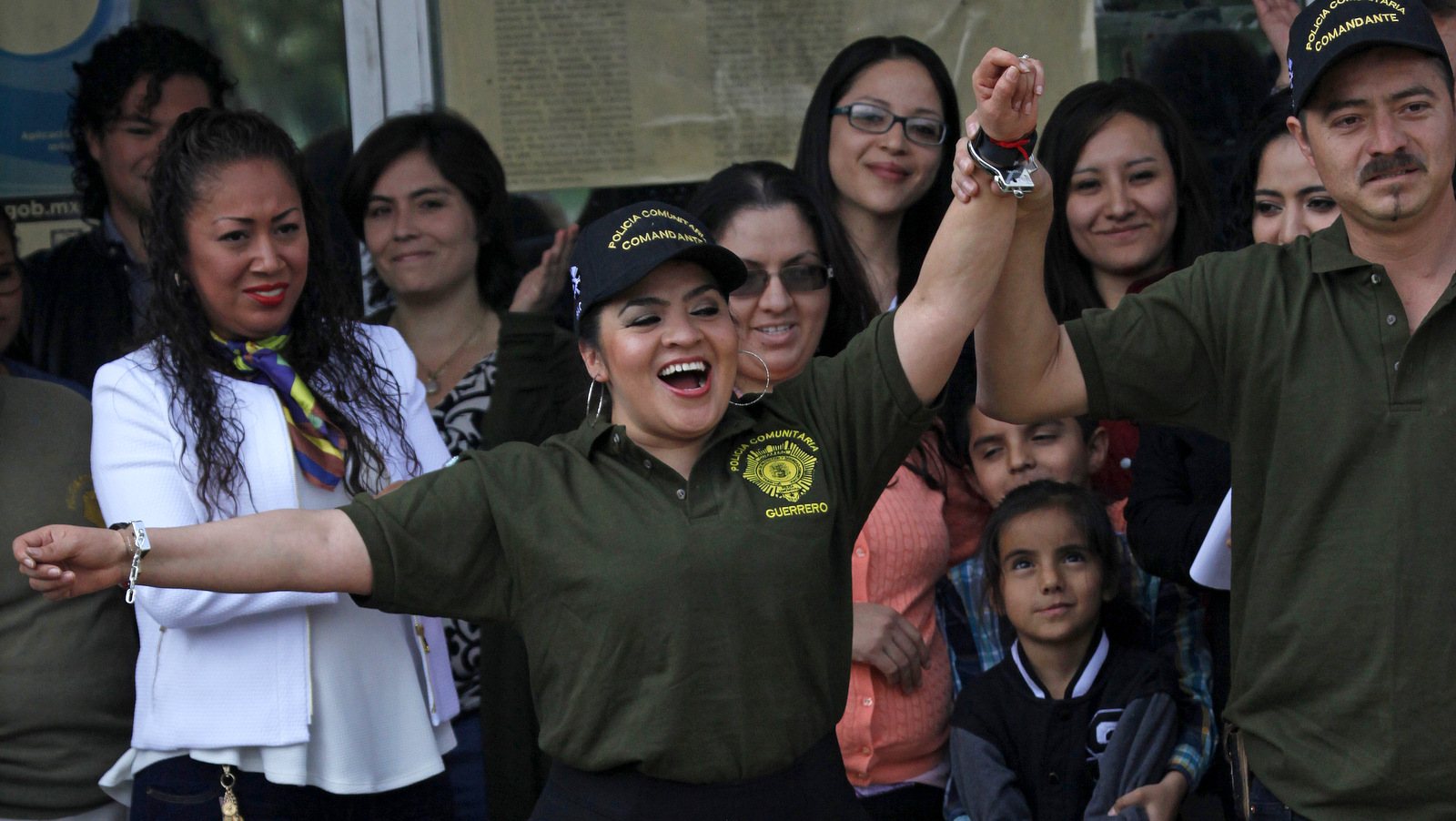 Surrounded by supporters, Nestora Salgado celebrates as she leaves Tepepan prison after courts threw out charges of homicide and kidnapping in Mexico City, March 18, 2016. Marco Ugarte | AP