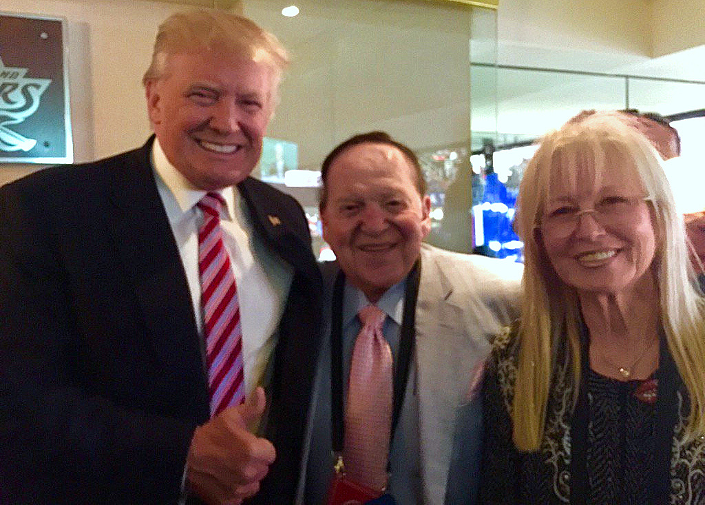 Donald Trump poses with Sheldon Adelson and his wife Miriam in Las Vegas. Photo | Andy Aboud