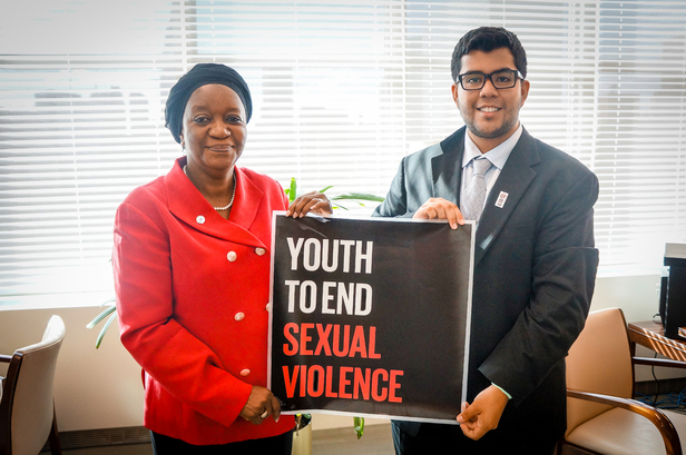 Joel Davis, chairman of Youth to End Sexual Violence, poses with Zainab Bangura, the UN's SRSG-SVC. Photo | Public Domain 
