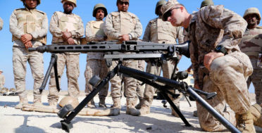 A U.S. Marine teaches Saudi Naval Forces how to use a MG-42 machine gun during exercise Red Reef 15. Rome M. Lazarus | US Marine Corp