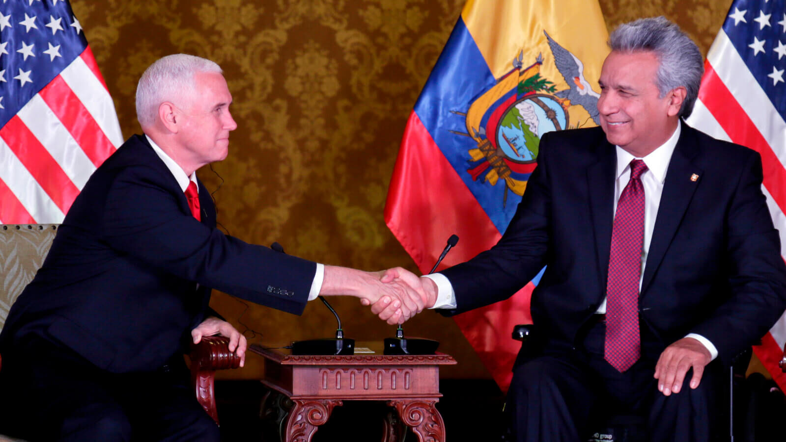 Ecuador's President Lenin Moreno, right, shakes hand with U.S. Vice President Mike Pence at the government palace in Quito, Ecuador, June 28, 2018. Dolores Ochoa | AP