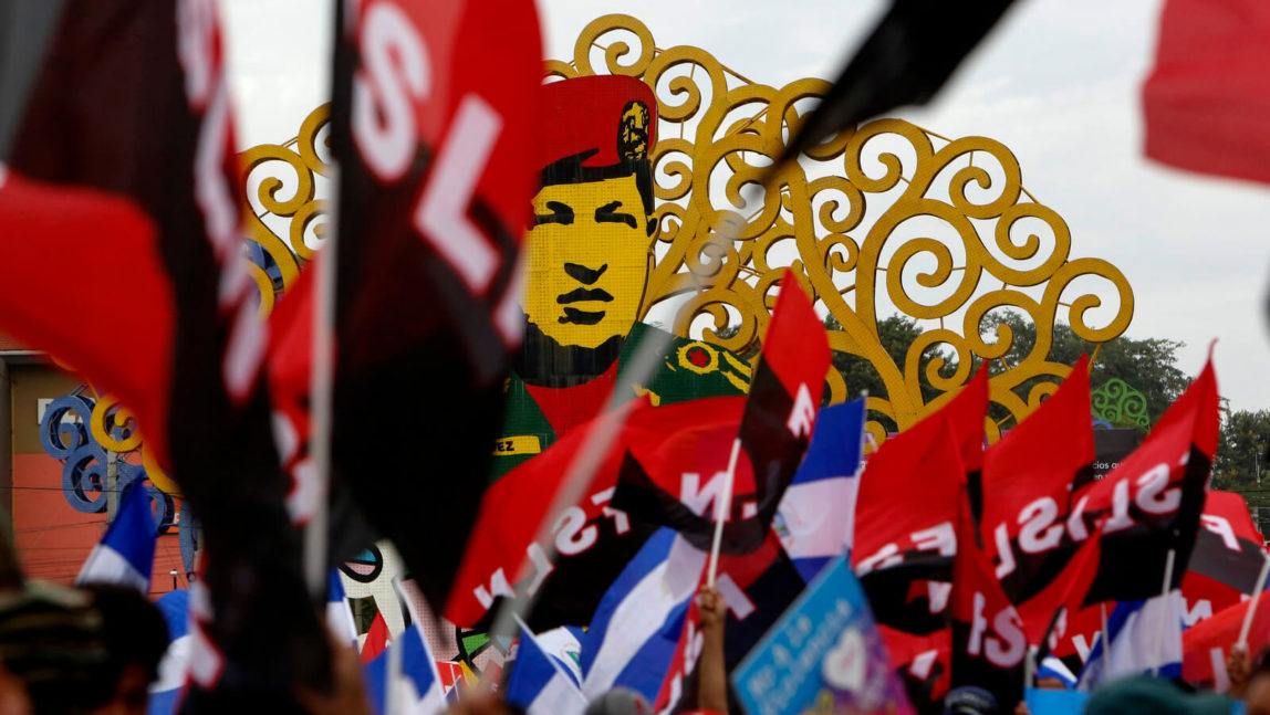 Sandinista party faithful and followers of President Daniel Ortega wave their Sandinista flags in a march for peace, in Managua, Nicaragua, Saturday, July 7, 2018. According to Nicaraguan human rights groups more than 300 persons have been killed since ant-government protests started more than two months ago. Alfredo Zuniga | AP