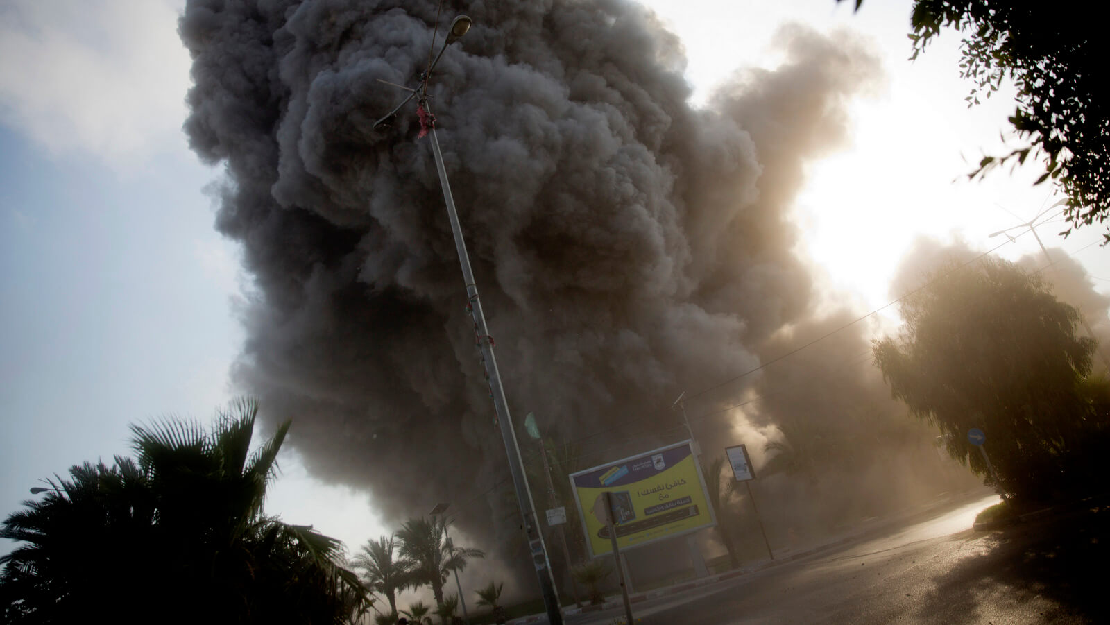 An Israeli airstrike hits a government building in Gaza City, July 14, 2018. The Israeli military carried out its largest campaign of airstrikes in Gaza since it's 2014 assault on the strip. Khalil Hamra | AP