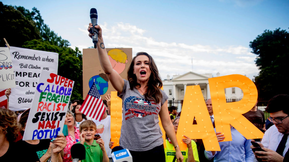 Actress Alyssa Milano speaks at a protest outside the White House, July 17, 2018, in Washington following President Donald Trump's meetings with Russian President Vladimir Putin. Andrew Harnik | AP