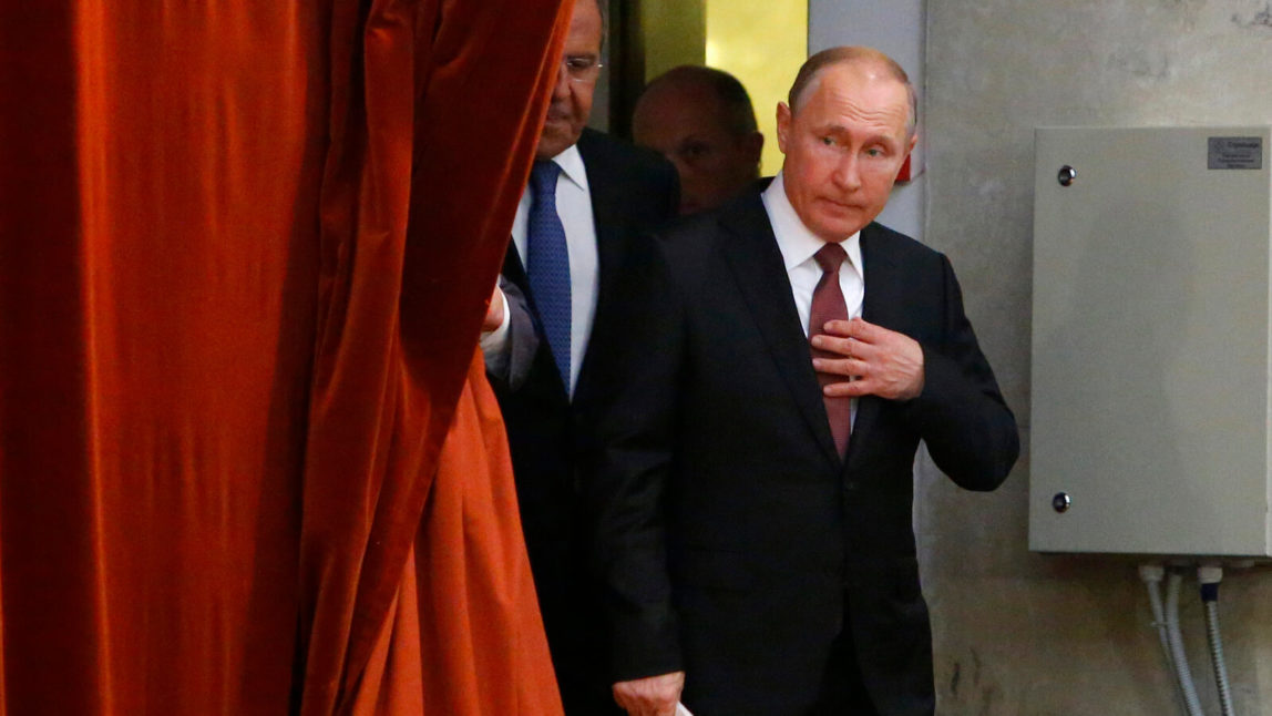 Russian Vladimir Putin arrives to attend a meeting with Russian ambassadors to foreign countries in Moscow, Russia, July 19, 2018. Putin says his first summit with U.S. President Donald Trump was "successful" and is accusing Trump's opponents in the U.S. of hampering any progress on the issues they discussed. Sergei Karpukhin | AP