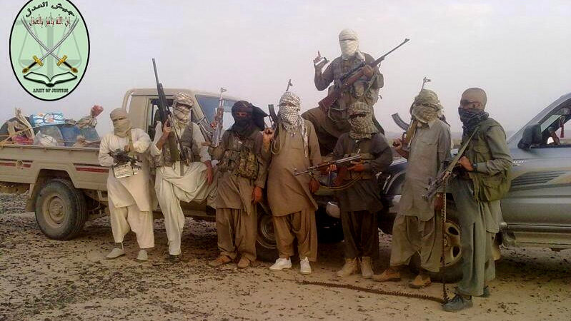 Members of the anti-Iranian Sunni extremist group Jaish al-Adl pose for a photo posted to Twitter.