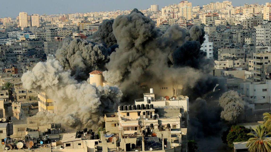 Smoke rises from an explosion caused by an Israeli airstrike in Gaza City, Aug. 9, 2018. Hatem Moussa | AP