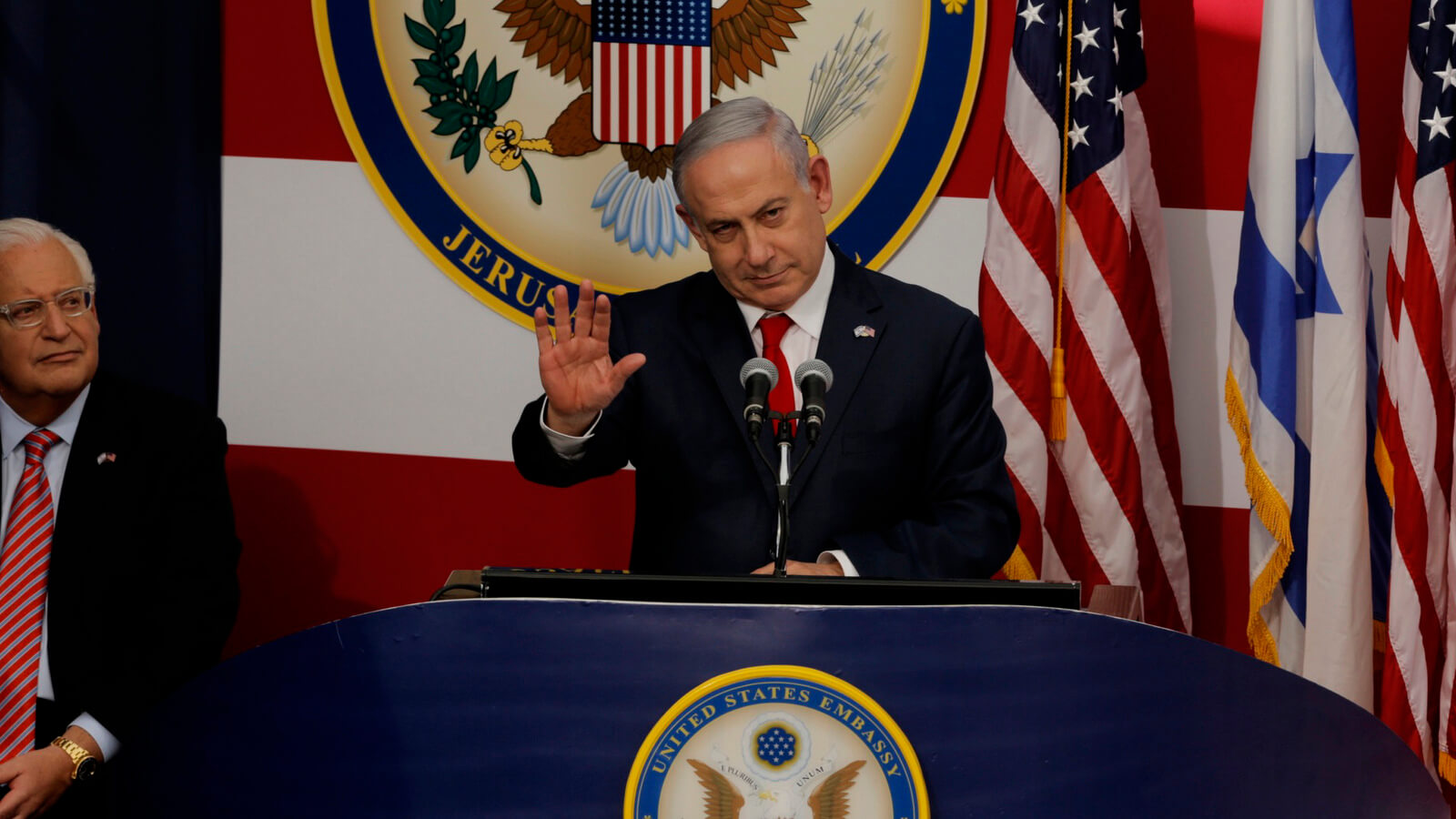Israel's Prime Minister Benjamin Netanyahu delivers his speech as U.S. ambassador to Israel David Friedman listen, during the opening ceremony of the new U.S. embassy in Jerusalem, May 14, 2018. Sebastian Scheiner | AP