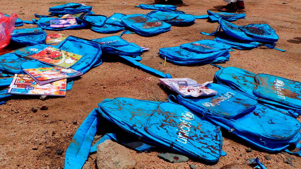 Children's backpacks lie at the site a day after Saudi Arabia conducted an airstrike on a school bus in Saada, Yemen on Friday, Aug. 10, 2018. The United Nations has called for an investigation into a Saudi-led coalition airstrike in the country's north that killed nearly 30 children. Kareem al-Mrrany | AP