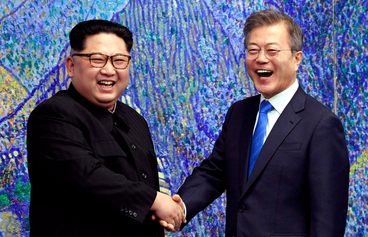 North Korean leader Kim Jong Un, left, poses with South Korean President Moon Jae-in inside the Peace House in the Demilitarized Zone, South Korea April 27, 2018 . Korea Summit Press | AP